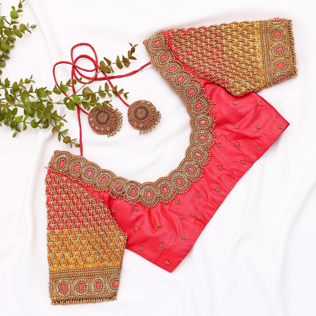 Introducing our stunning Light Red Embroidery blouse!