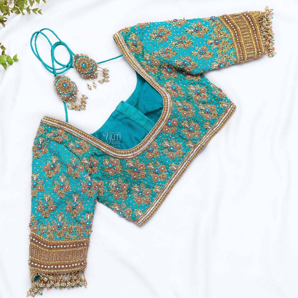 Introducing our exquisitely detailed Eastern Blue embroidery bridal blouse, designed to make you feel like royalty as you walk down the aisle.