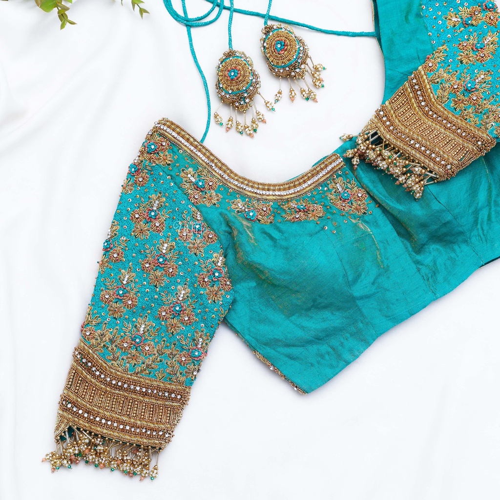 Introducing our exquisitely detailed Eastern Blue embroidery bridal blouse, designed to make you feel like royalty as you walk down the aisle.