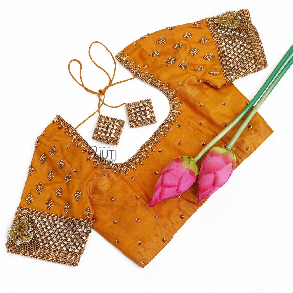 orange-blouse-with-kundan-work-by-yuti-designers-3