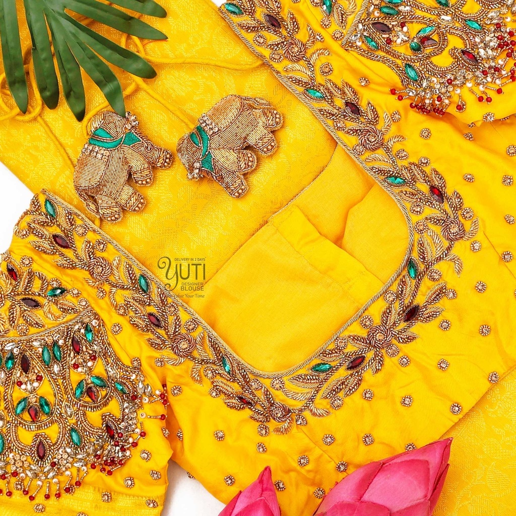 Yellow blouse with contrast stone