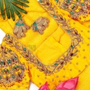 Yellow blouse with contrast stone