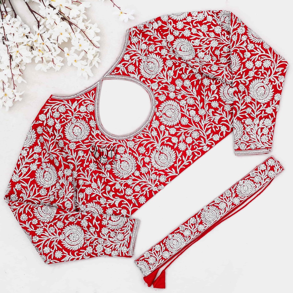 Red blouse with silver floral design