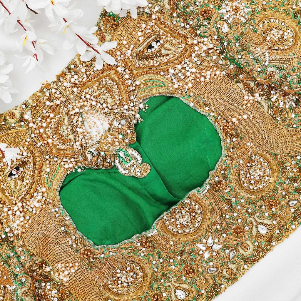 Green elephant with hanging bridal blouse