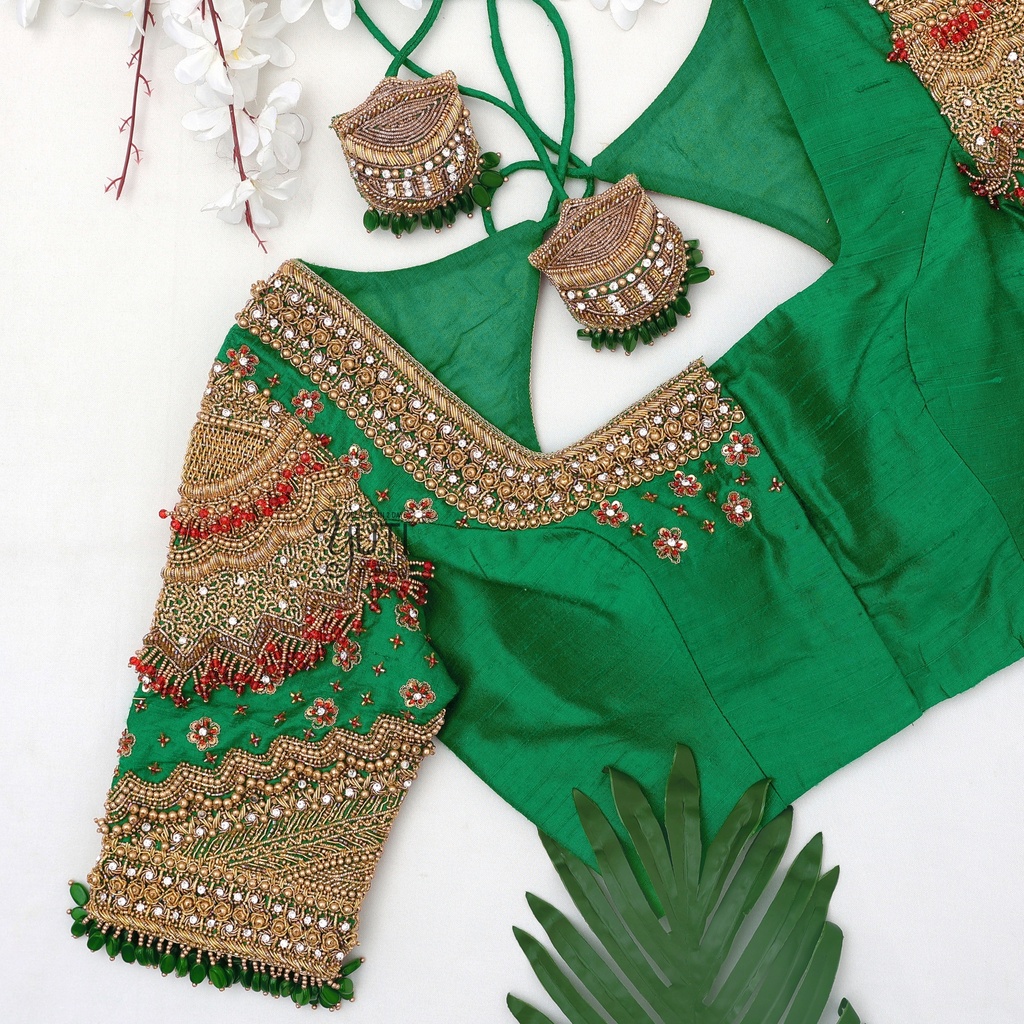 Green Navratna bridal blouse with gem hangings