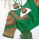 Green Navratna bridal blouse with gem hangings