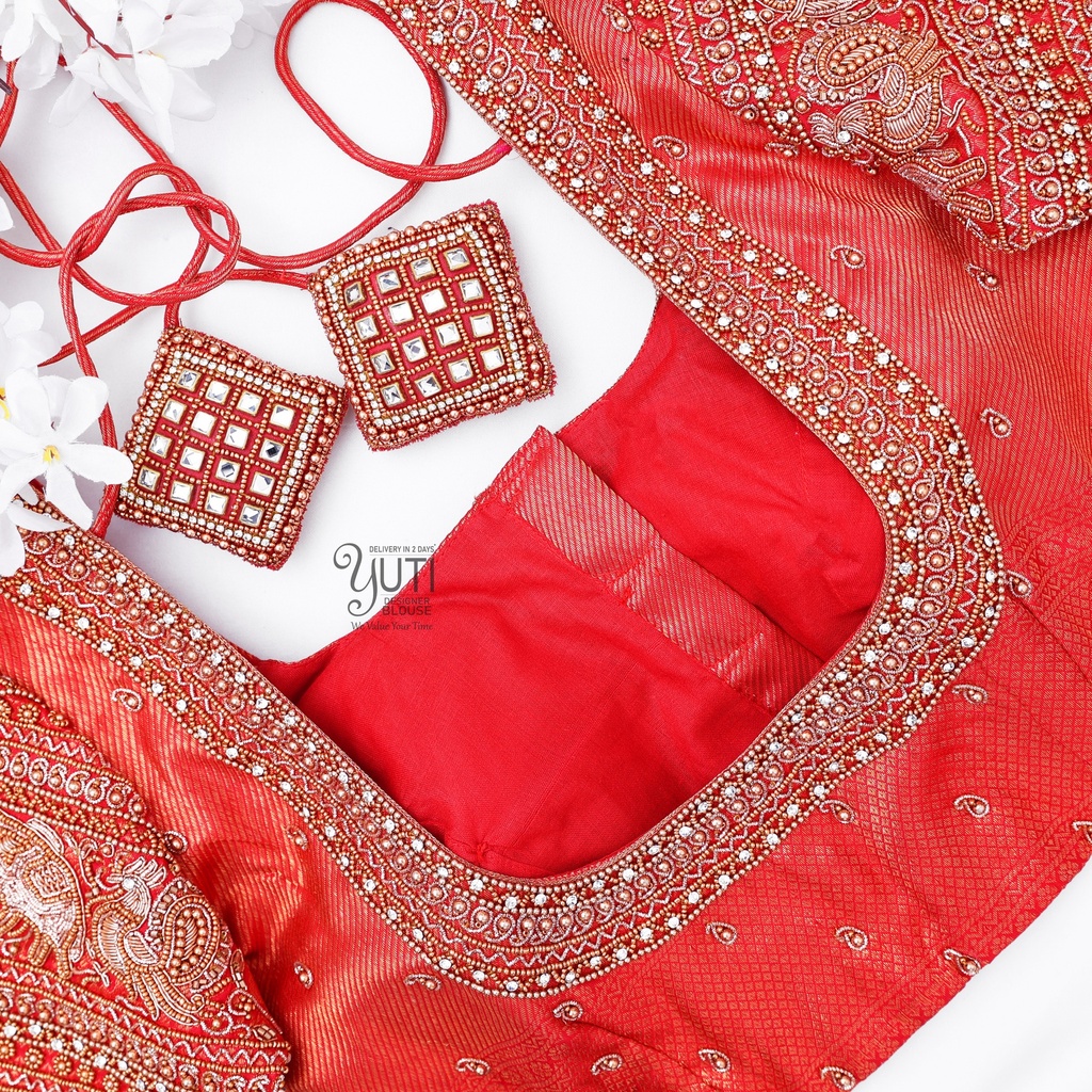 Red Peacock and Elephant Highlight Bridal Design