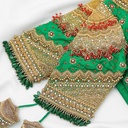 Green Navratna bridal blouse with gem hangings