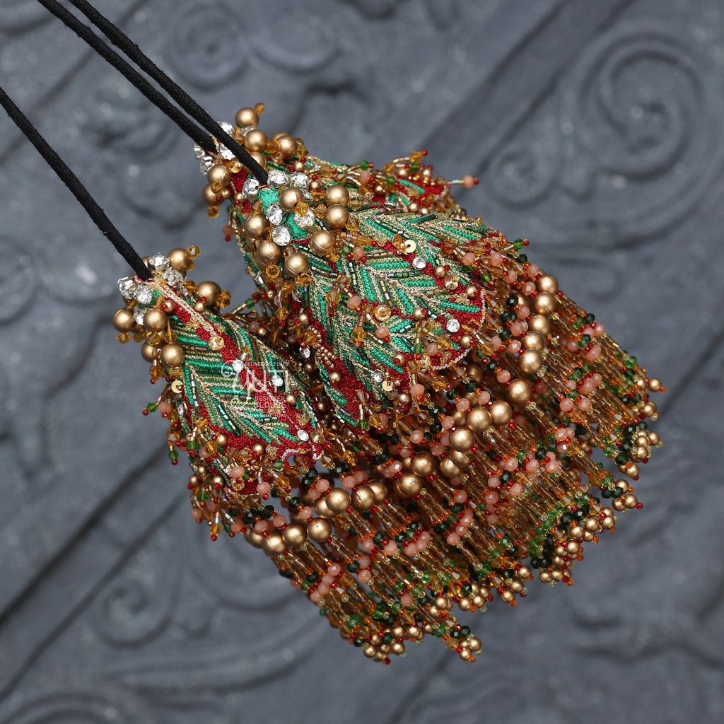 Coconut Kunjalam with crystal hangings