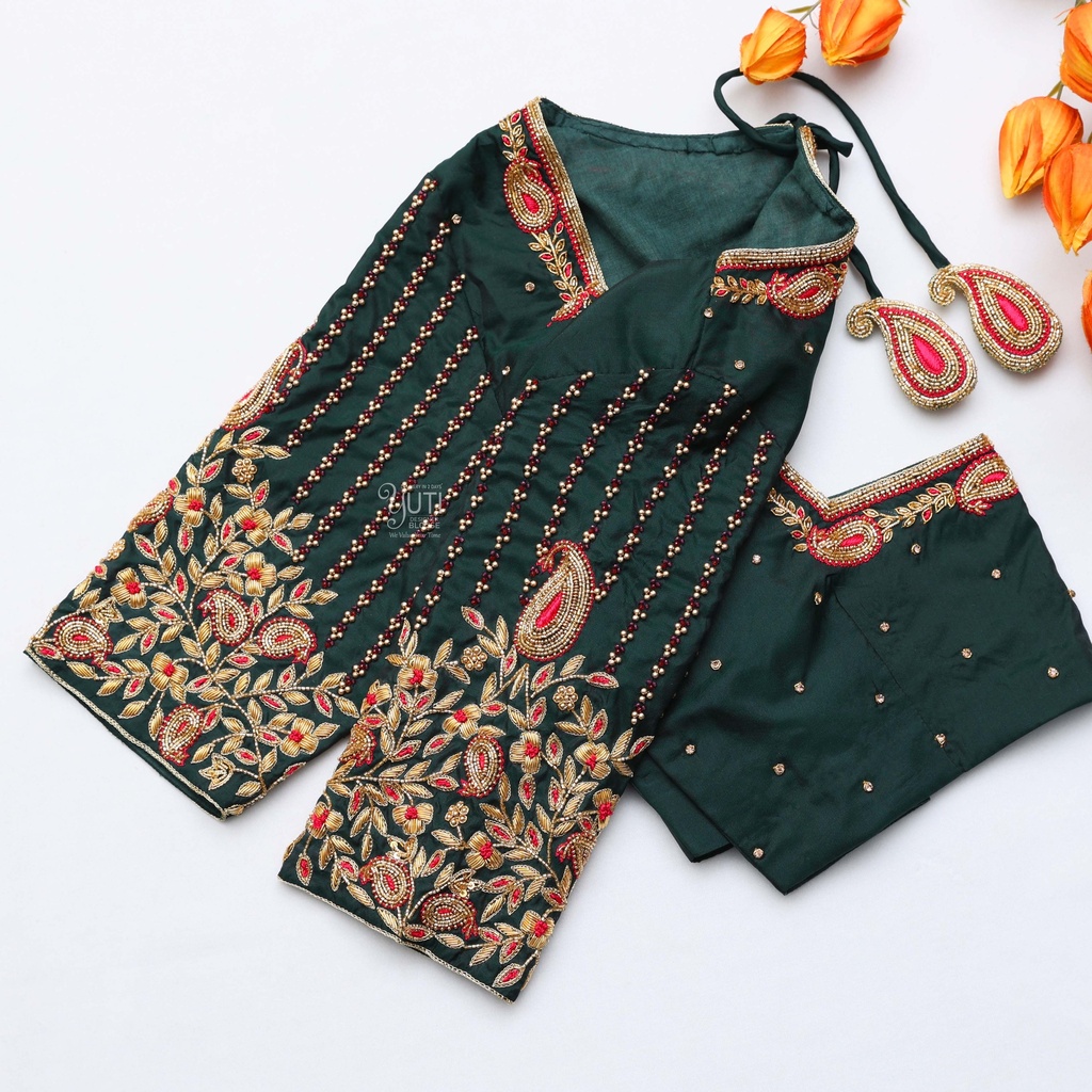 Step into the spotlight with a dark green Aari bridal blouse that exudes grace and charm: