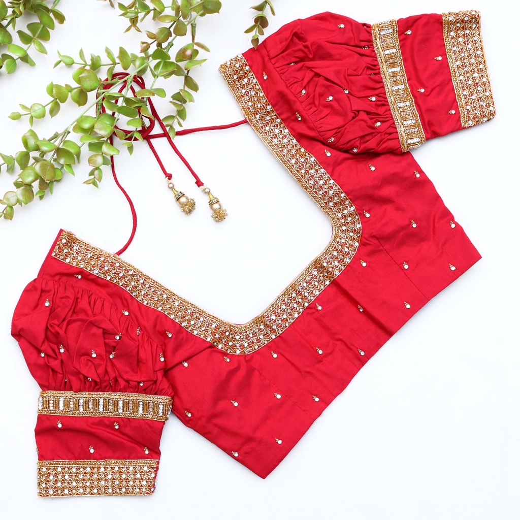Celebrating love and elegance with this stunning red bridal blouse