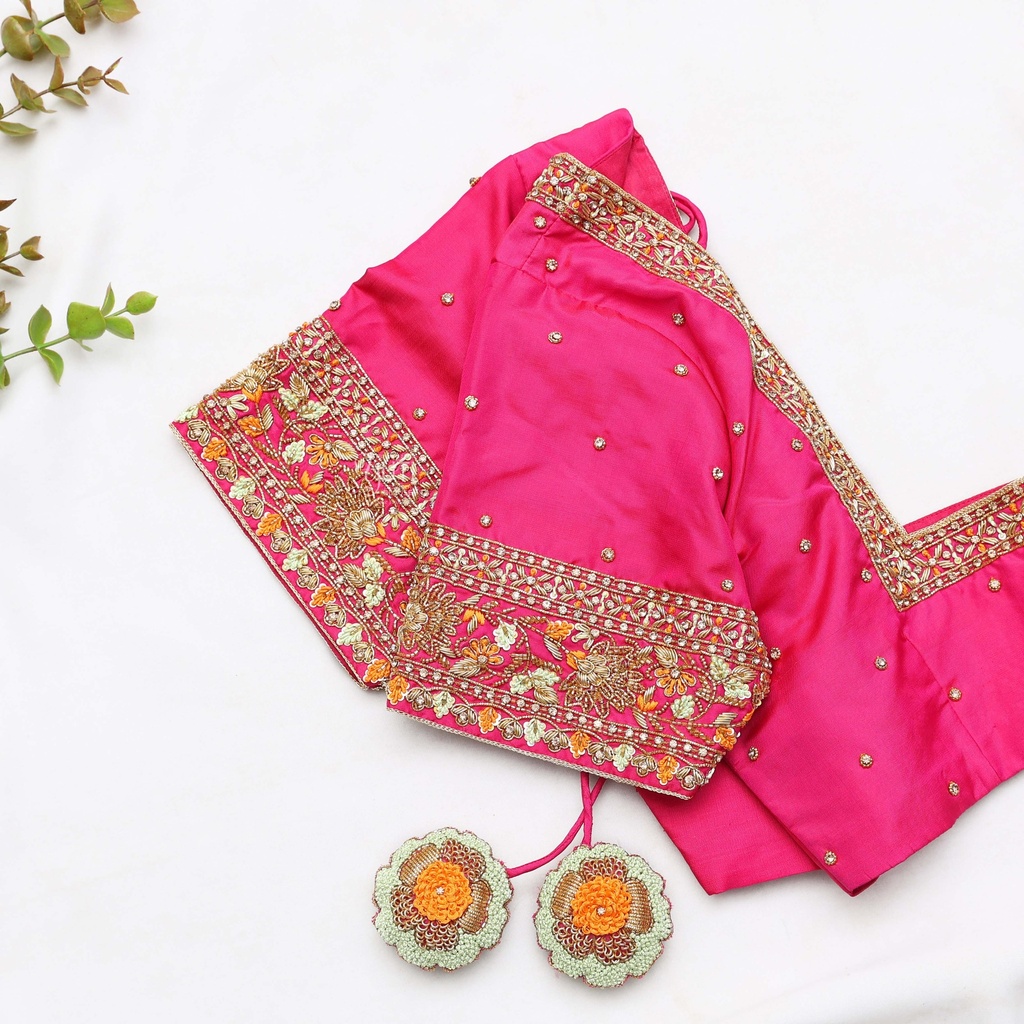 traditional Indian attire with this stunning pink embroidered Blouse