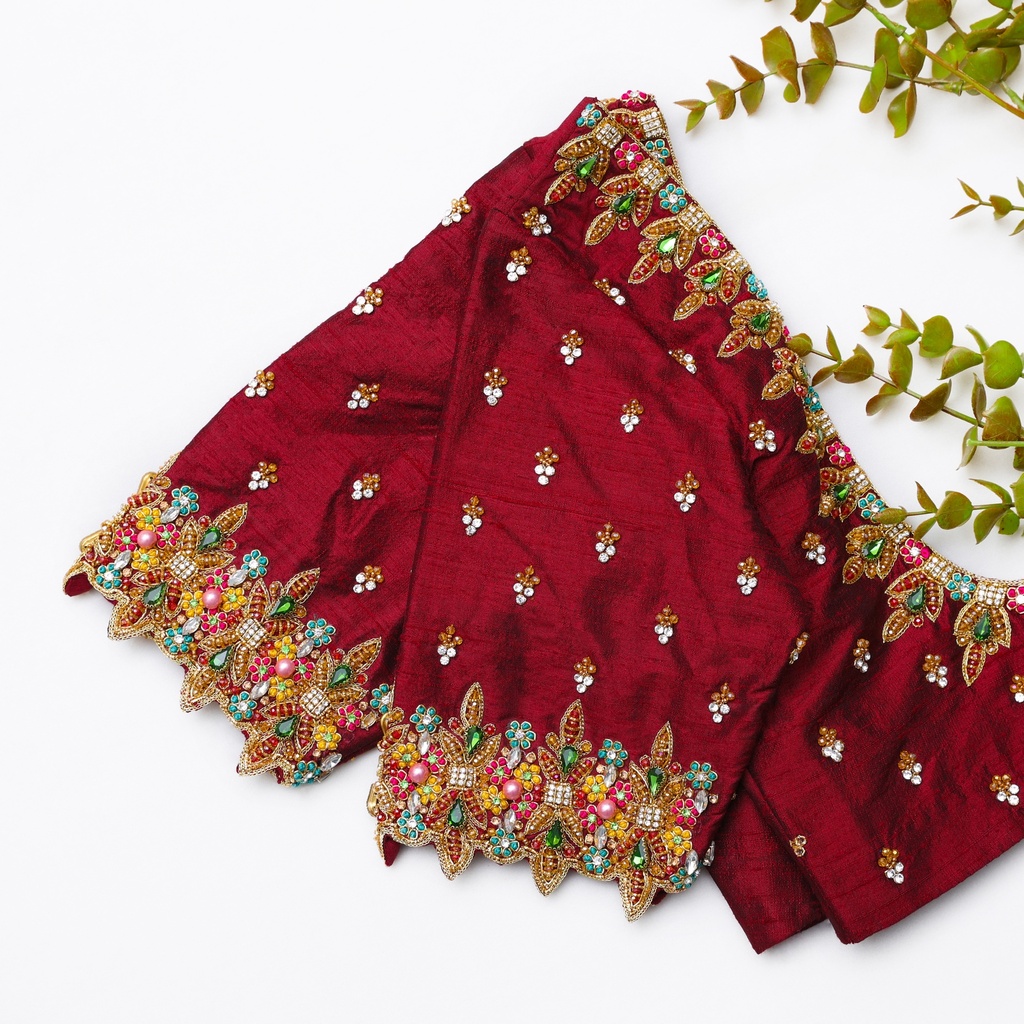 Step into elegance with this stunning red color embroidery bridal blouse!