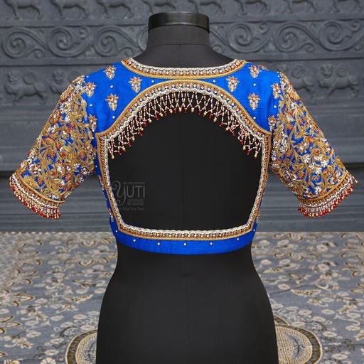Unveil the beauty of dark blue open back embroidery bridal blouse.
