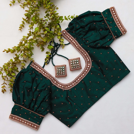 Featuring intricate green color embroidery bridal blouse