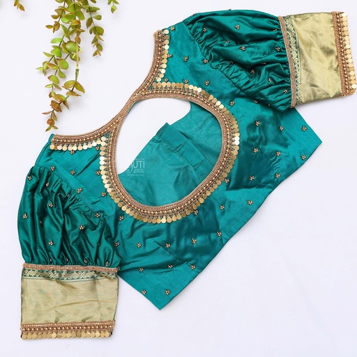 Embodying timeless elegance in this stunning Persian Green Bridal Blouse