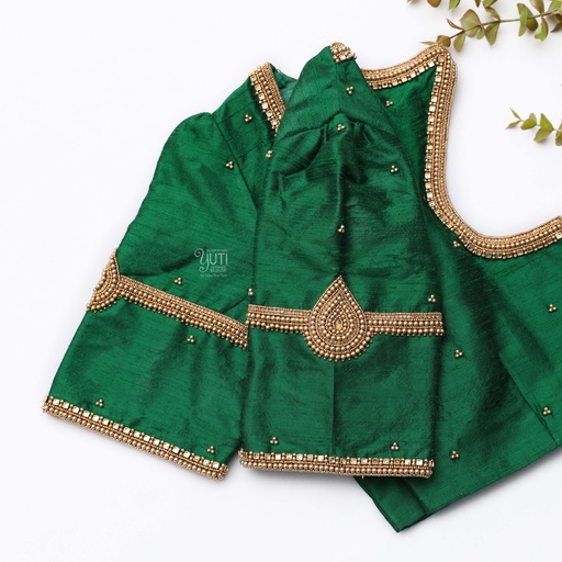Embrace the elegance of this stunning green blouse