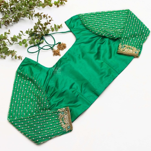Step up your fashion game with this stunning green blouse