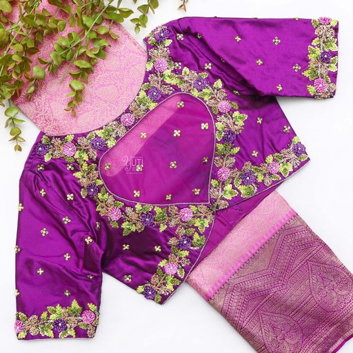 Flaunting the vibrant colors of spring with this purple blouse and its floral design.
