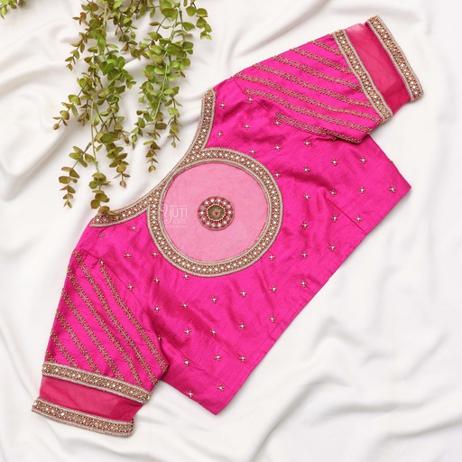 Pretty in pink . Rocking this stylish circular design blouse