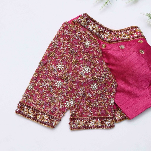 Featuring intricate embroidery and elegant design, this blouse is sure to turn heads